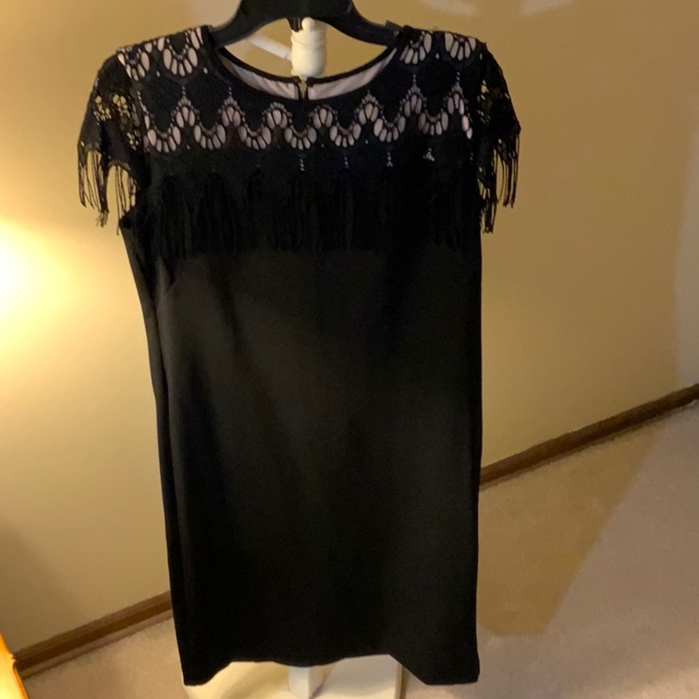 Black cocktail dress with fringe